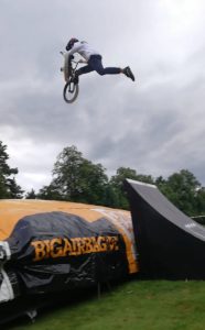 A rider pulling a trick on the Dirt Factory Air Bag