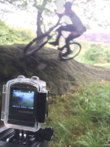 Picture of Olfi action camera capturing mountain biker