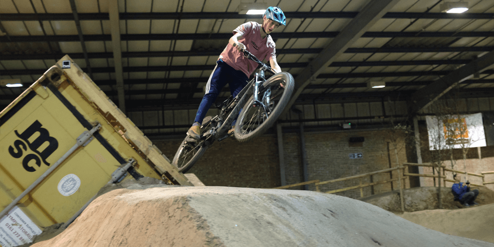 Rider learning to jump at Dirt Factory Manchester.