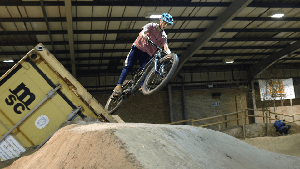 Rider learning to jump at Dirt Factory Manchester.